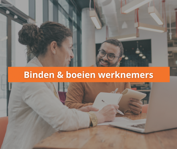 Werkgever in gesprek met medewerker